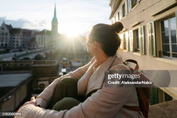 female tourist discovering the new city - cobblestone stock pictures, royalty-free photos & images