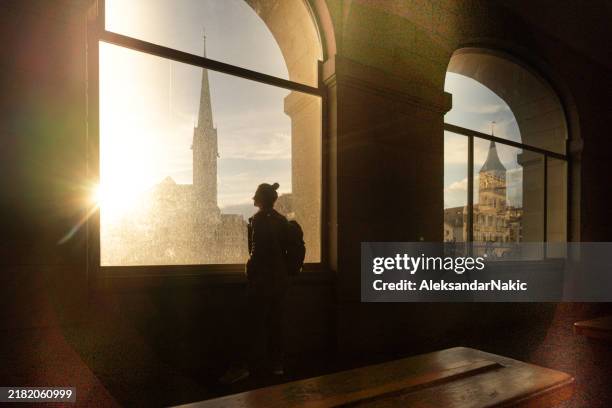 female tourist discovering the new city - zurich stock pictures, royalty-free photos & images