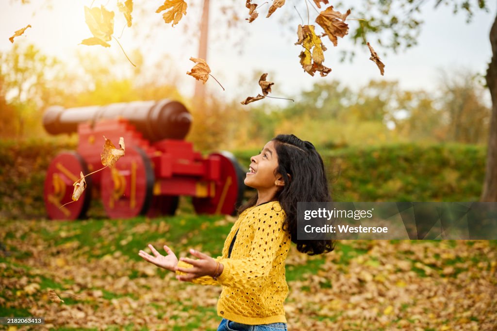 Eight years old girl playing in park