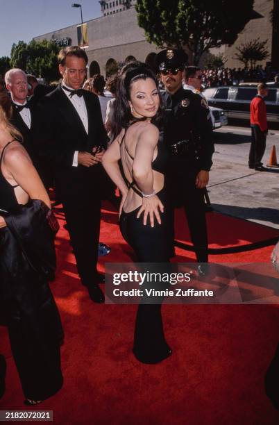American actress Fran Drescher posing in a backless black evening dress at the 48th Primetime Emmy Awards at the Pasadena Civic Auditorium in...