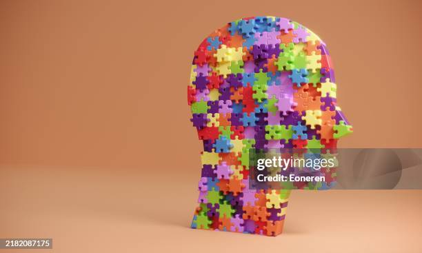 head made from jigsaw puzzles - neurodiversity abstract stock pictures, royalty-free photos & images
