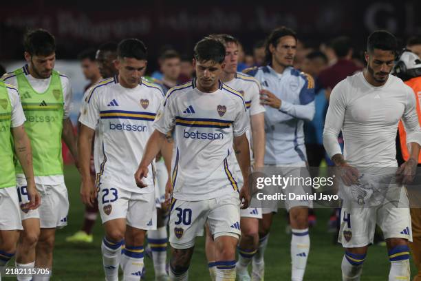 Players of Boca Juniors leave the field at the end of a 1-0 loss in the Liga Profesional 2024 match between Lanus and Boca Juniors at Estadio Ciudad...