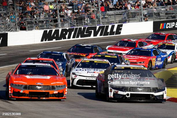 Ryan Blaney and Brad Keselowski lead the field for a restart during the running of the NASCAR Cup Series Playoff Race Xfinity 500 on November 03,...