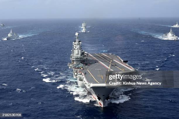 The formation of Chinese aircraft carrier Liaoning carry out a regular real-combat training in the high seas in late October 2024. The formations of...