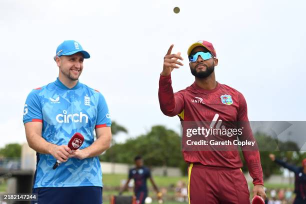 West Indies captain Shai Hope tosses the coin alongside England captain Liam Livingstone ahead of the first One Day International between the West...