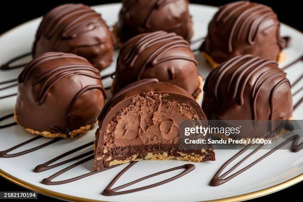 close-up of chocolate cake in plate - chocolate pieces stock pictures, royalty-free photos & images
