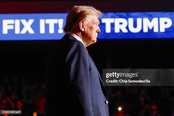 Republican presidential nominee, former President Donald Trump greets supporters during a campaign rally at Lee’s Family Forum on October 31, 2024 in...