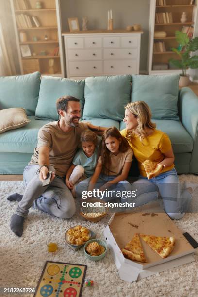 family's weekend at home! - family television stock pictures, royalty-free photos & images