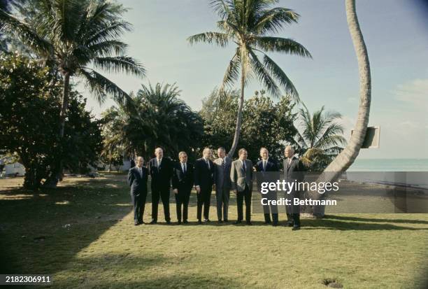 President Richard Nixon posing with key advisors in the grounds of his newly-acquired property in Key Biscayne, Florida, December 28th 1968. From...