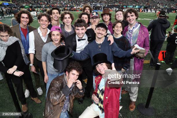 Timothée Chalamet look-alikes appear on the sideline during the Houston Texans vs. New York Jets Thursday Night Football game at MetLife Stadium on...