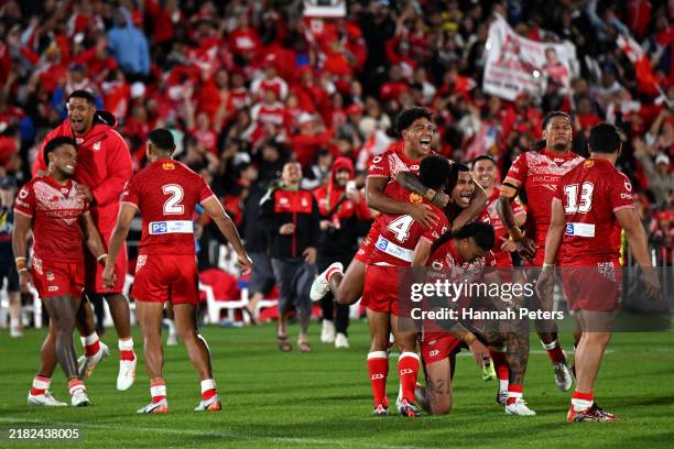 Tonga celebrate winning the men's 2024 Rugby League Pacific Championship match between New Zealand Kiwis and Tonga XIII at Go Media Stadium on...