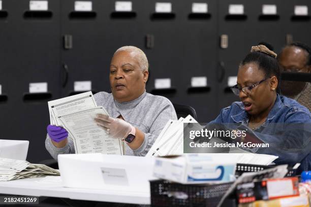 Gwinnett County election workers start processing absentee ballots at the Gwinnett Voter Registrations and Elections on November 5, 2024 in...