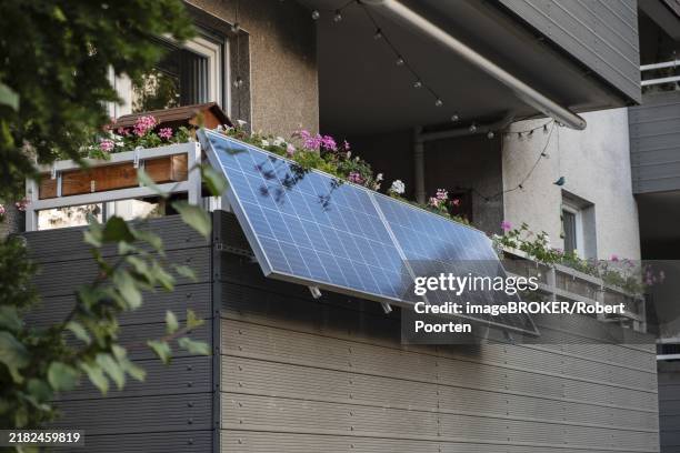 balcony power plant on an apartment building in düsseldorf - kraftwerk stock-fotos und bilder