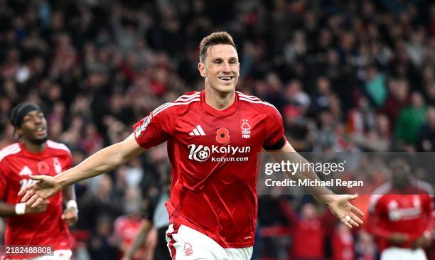 Chris Wood of Nottingham Forest celebrates scoring his team's first goal during the Premier League match between Nottingham Forest FC and West Ham...