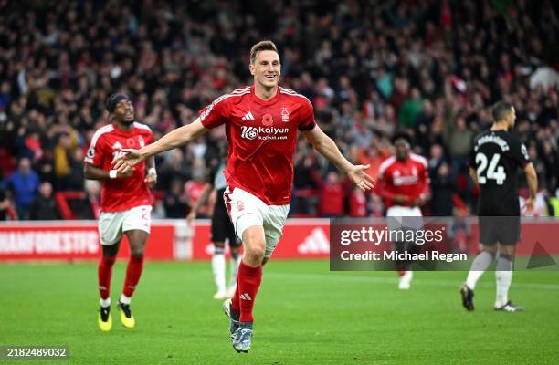 Chris Wood of Nottingham Forest celebrates scoring his team's first goal during the Premier League match between Nottingham Forest FC and West Ham...