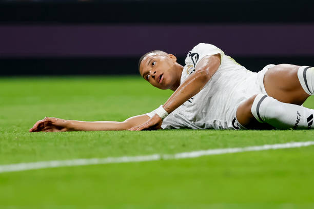 Madrid, Spain Kylian Mbappe of Real Madrid on the ground during the UEFA Champions League 2024/25 League Phase MD4 match between Real Madrid C.F. And...