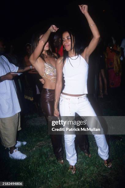 Natane Adcock and Aaliyah attend Puffy's Fourth of July Party at Sean Combs' House on July 2, 2000 in East Hampton, NY.