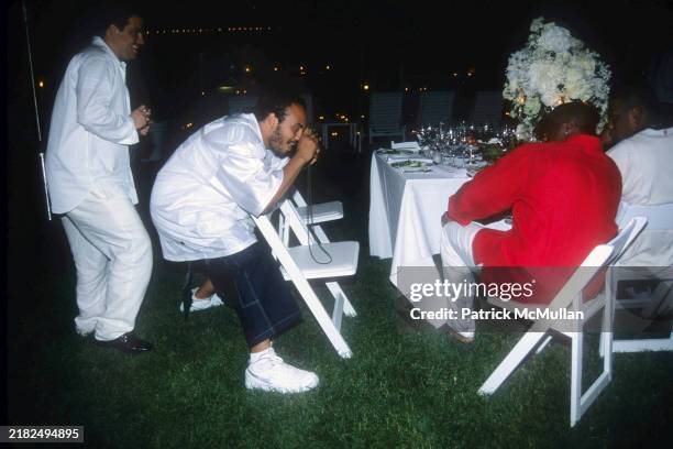 Brett Ratner, Hype Williams and Sean Combs attend Puffy's Fourth of July Party at Sean Combs' House on July 2, 2000 in East Hampton, NY.
