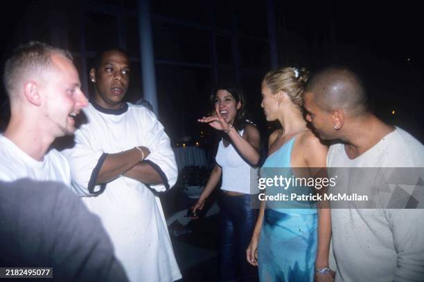 Guest, Jay-Z, Lynda Lopez, Jennifer Lopez and Benny Medina attend Puffy's Fourth of July Party at Sean Combs' House on July 2, 2000 in East Hampton,...