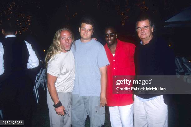 Mark Baker, Arthur Demarchelier, Sean Combs and Patrick DeMarchelier attend Puffy's Fourth of July Party at Sean Combs' House on July 2, 2000 in East...