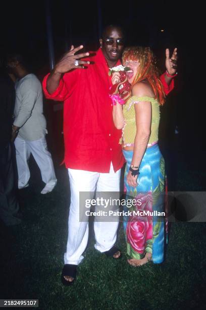 Sean Combs and Betsey Johnson attend Puffy's Fourth of July Party at Sean Combs' House on July 2, 2000 in East Hampton, NY.