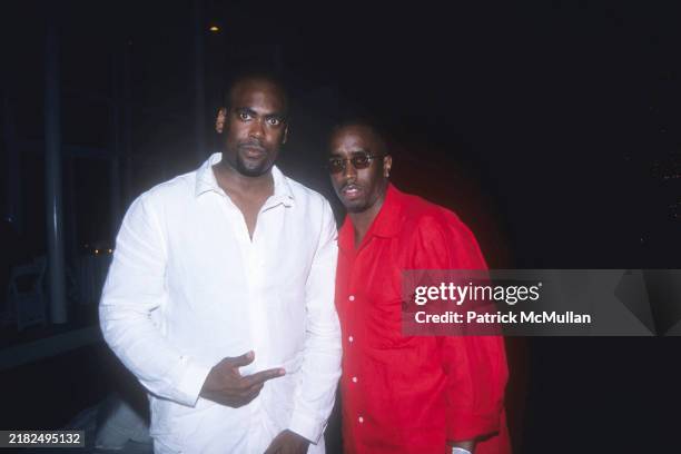 Lionel Ridenour and Sean Combs attend Puffy's Fourth of July Party at Sean Combs' House on July 2, 2000 in East Hampton, NY.