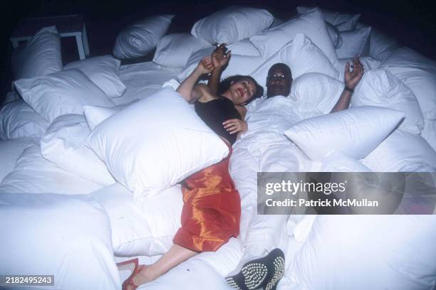 Lisa Zane and Andre Harrell attend Puffy's Fourth of July Party at Sean Combs' House on July 2, 2000 in East Hampton, NY.