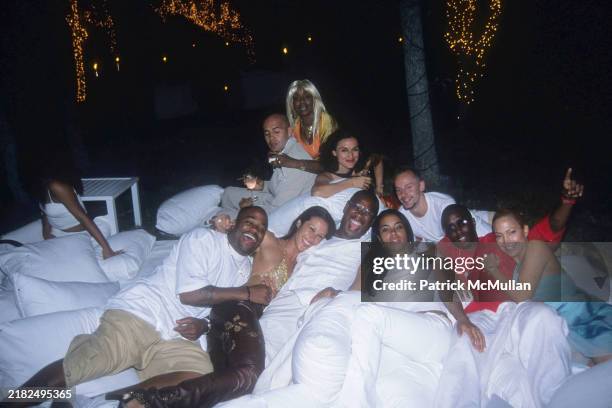 Damon Dash, Billy Zane, Natane Adcock, Janice Combs, Lisa Zane, Andre Harrell, Aaliyah, guest, Sean Combs and Jennifer Lopez attend Puffy's Fourth of...