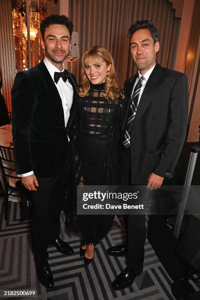 Aidan Turner, Bella Maclean and Alex Hassell pose at the 2024 Harper's Bazaar Women of the Year Awards, held in partnership with The Platinum Card by...