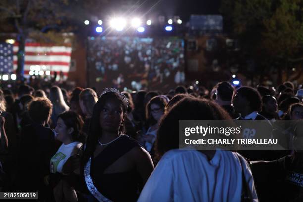 Young woman in a tiara attends an election night event for US Vice President and Democratic presidential candidate Kamala Harris at Howard University...