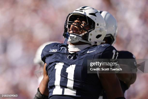 Abdul Carter of the Penn State Nittany Lions celebrates after sacking Will Howard of the Ohio State Buckeyes during the second quarter at Beaver...
