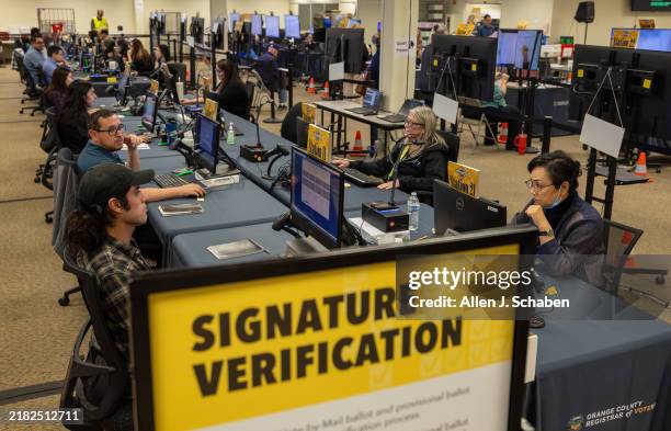 Santa Ana, CA An election workers verify signatures on ballots at the Orange County Registrar of Voters in Santa Ana Tuesday, Nov. 5, 2024.