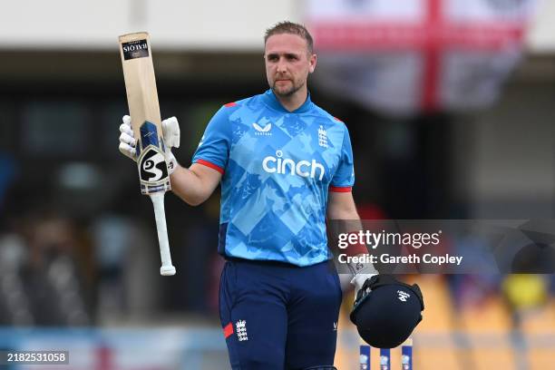 Liam Livingstone of England celebrates reaching his century during the Second One Day International between the West Indies and England at Sir Vivian...