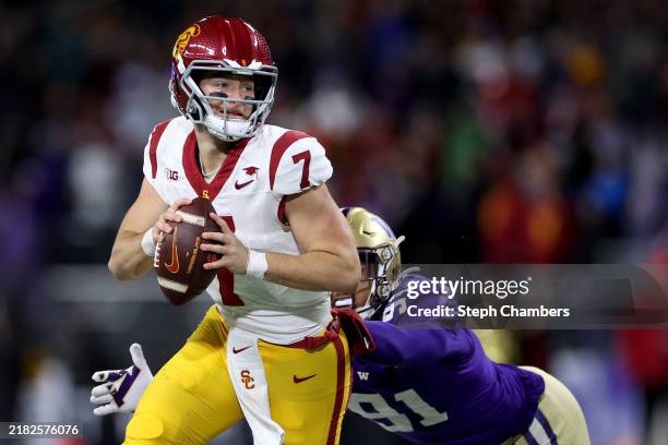 Miller Moss of the USC Trojans scrambles against the Washington Huskies during the second half at Husky Stadium on November 02, 2024 in Seattle,...