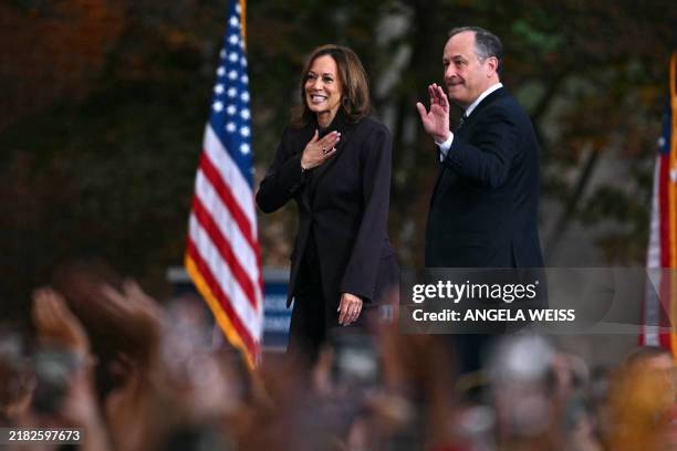 Vice President Democratic presidential candidate Kamala Harris and her husband Second Gentleman Doug Emhoff leave after she delivered her concession...