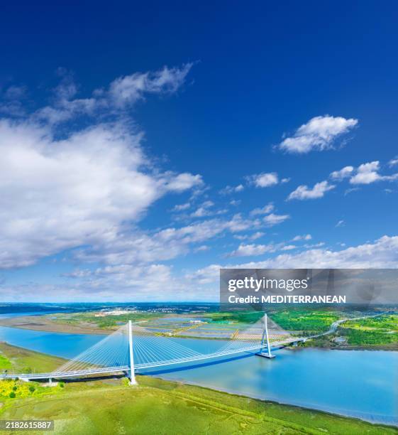 puente internacional del guadiana bridge aerial view frontier between spain and portugal - guadiana international bridge stock pictures, royalty-free photos & images