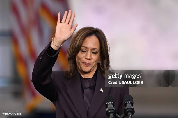 Vice President Democratic presidential candidate Kamala Harris waves at supporters at the end of her concession speech at Howard University in...