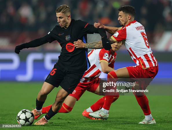 Barcelona Rade Fermin Lopez of Barcelona in action against Rade Krunic of Crvena ...