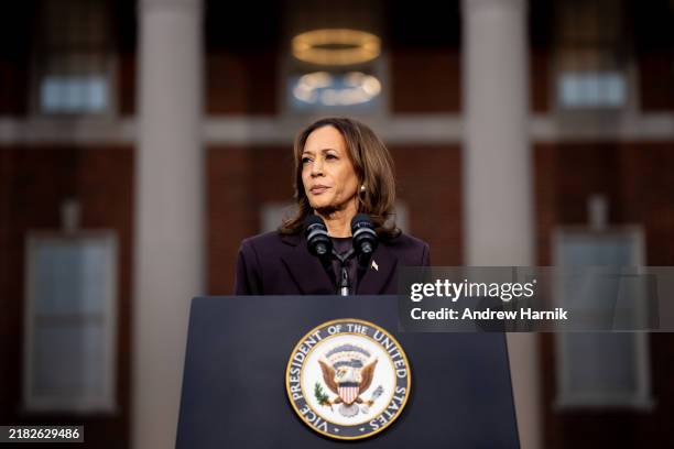 Democratic presidential nominee, U.S. Vice President Kamala Harris pauses while speaking on stage as she concedes the election, at Howard University...