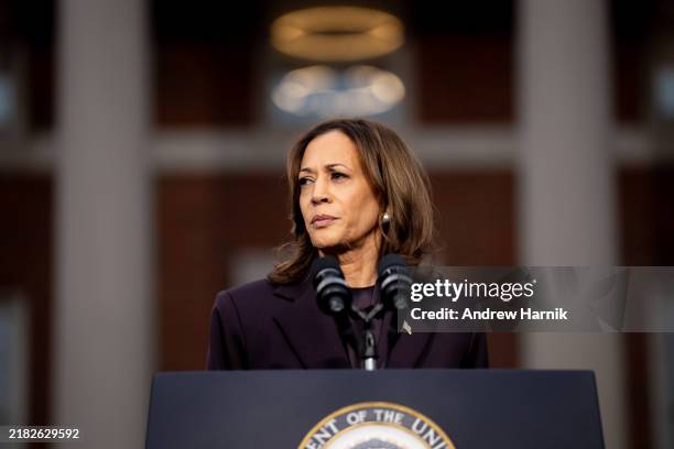Democratic presidential nominee, U.S. Vice President Kamala Harris pauses while speaking on stage as she concedes the election, at Howard University...
