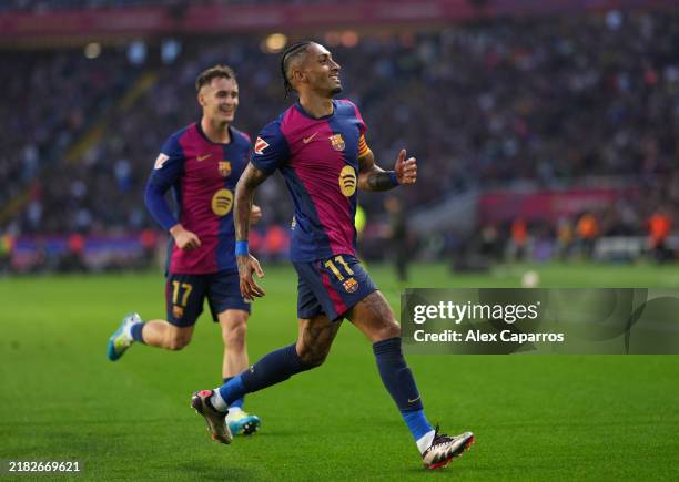 Raphinha of FC Barcelona celebrates scoring his team's second goal during the La Liga EA Sports match between FC Barcelona and RCD Espanyol at Estadi...