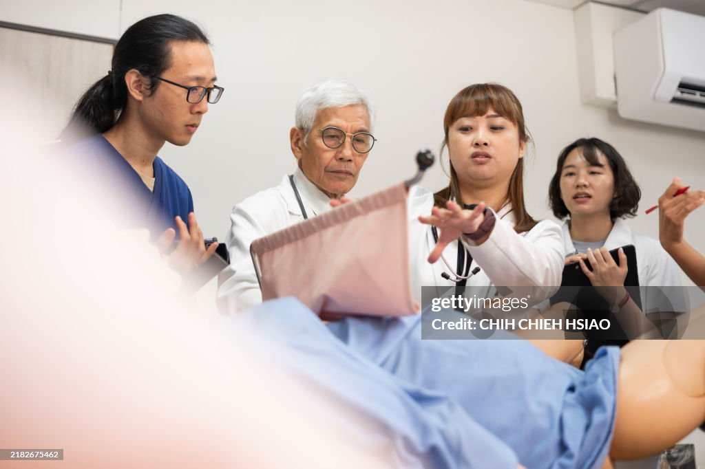 Jessica Fu A Young Asian Female Obstetrician And An Experienced Senior Professor ...