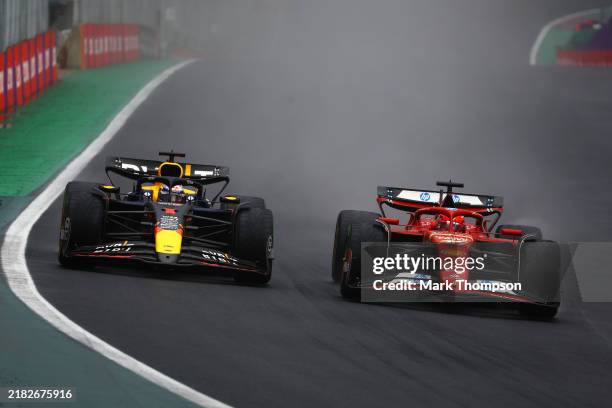 Charles Leclerc of Monaco driving the Ferrari SF-24 and Max Verstappen of the Netherlands driving the Oracle Red Bull Racing RB20 battle for position...