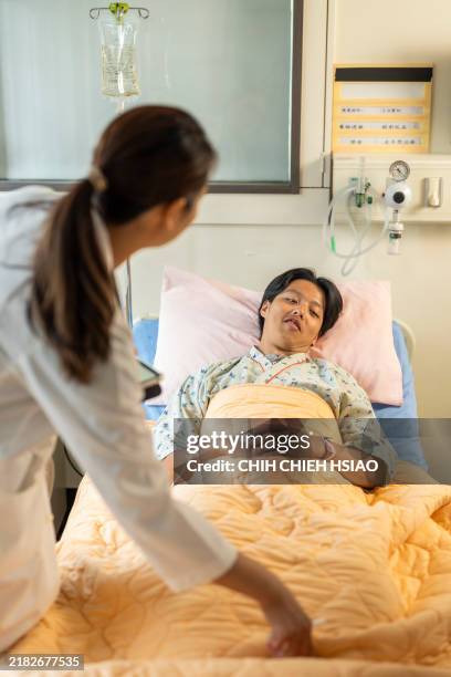 Doctor Rounding 18 Nurse Rounding Stock Photos, High-Res Pictures, and Images - Getty ...