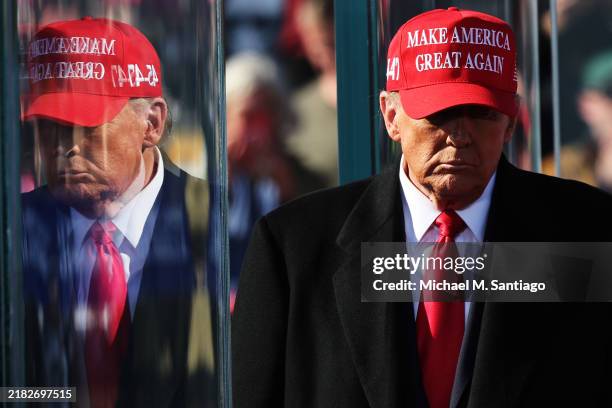 Republican presidential nominee, former U.S. President Donald Trump walks off stage after speaking during a campaign rally at Lancaster Airport on...