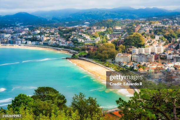 playa de ondarreta and la concha, san sebastian, donostia, basque country, spain - san sebastian spain stock pictures, royalty-free photos & images