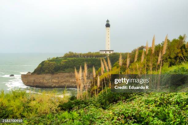 landscape of biarritz lighthouse, france - biarritz fotografías e imágenes de stock