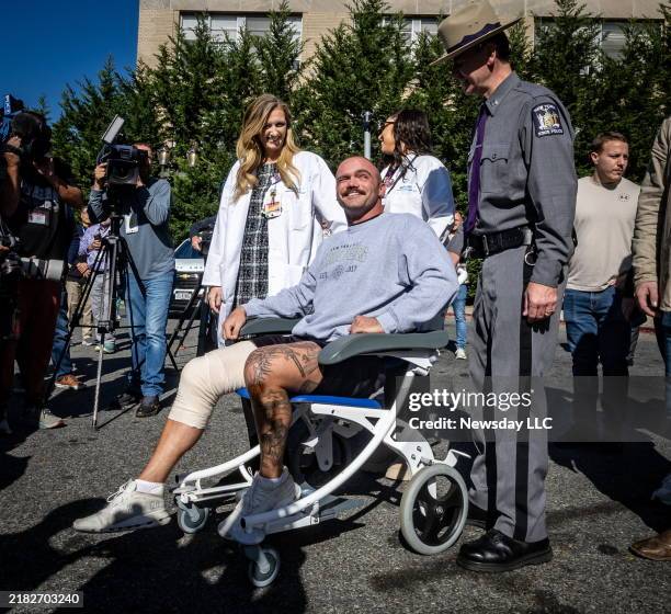 New York State Trooper Thomas Mascia in a wheelchair leaving Nassau University Medical Center in East Meadow, New York, on Nov. 1, 2024. Mascia was...