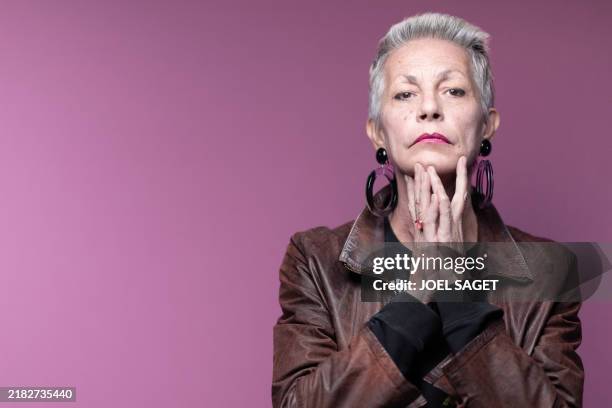 Portuguese-Belgian singer and actress Lio poses during a photo session in Paris on November 7, 2024.