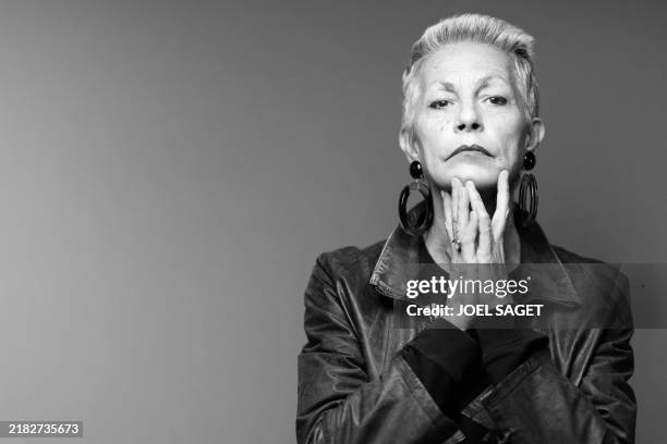 Portuguese-Belgian singer and actress Lio poses during a photo session in Paris on November 7, 2024.